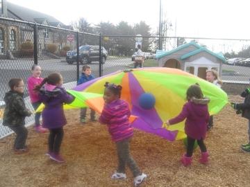 Students playing outside at preschool